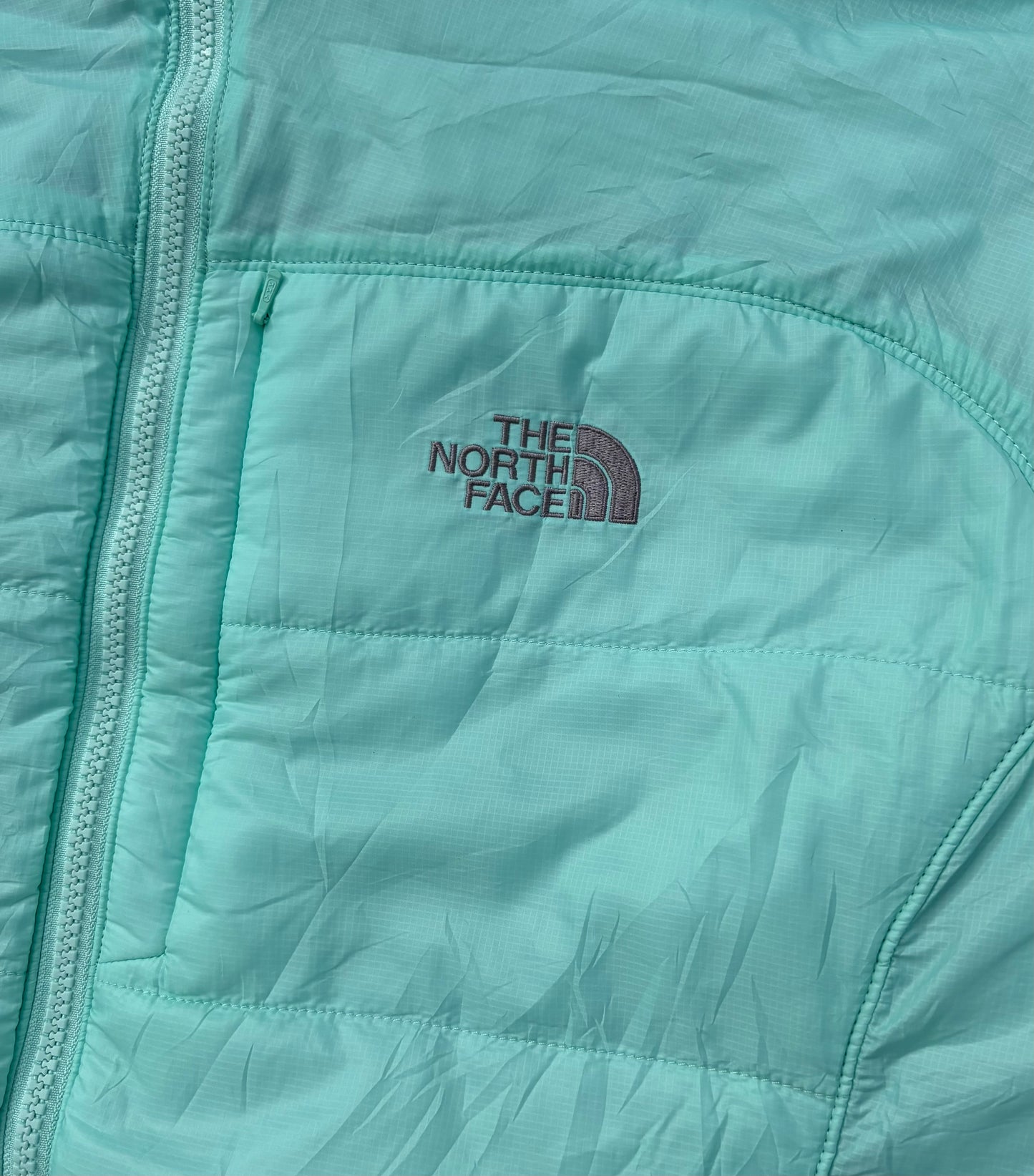 THE NORTH FACE SYNTHETIC PUFFER